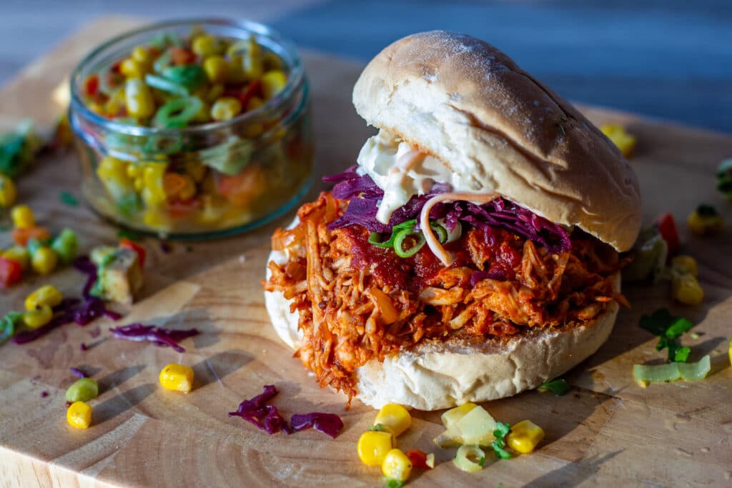 Pulled Chicken in a bun with salsa