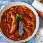 Bowl of Slow Cooker Sausage Cassoulet and vegetables