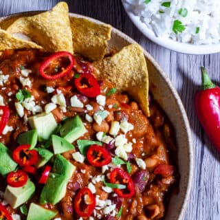 Over head view of Slow Cooker Bean chilli with rice and tortillas