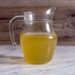a jug of slow cooker chicken stock