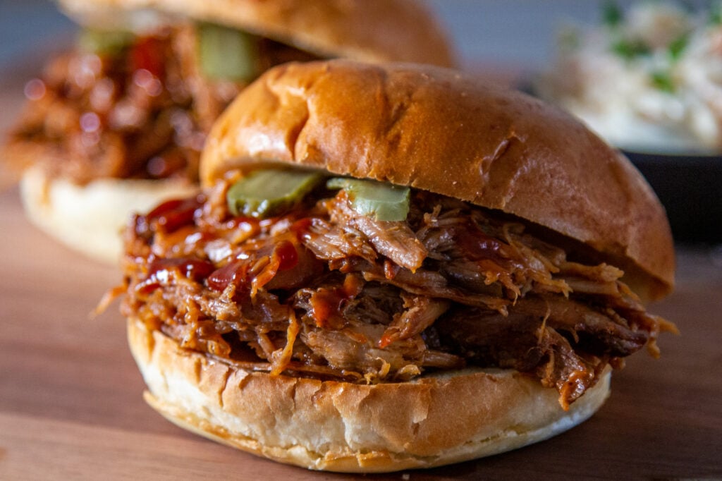 Slow Cooker Pulled Pork with BBQ sauce in a bun.