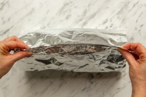 Picture showing how to wrap doner kebab meat in foil ready for cooking in the Crockpot.