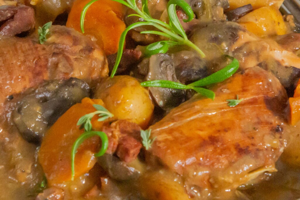 Close up view of chicken and vegetables from crockpot chicken stew.