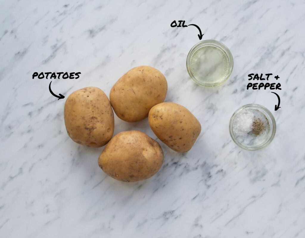 Ingredients to make Slow Cooker Jacket Potatoes.