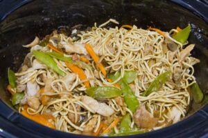 Freshly cooked slow cooker chicken noodles.